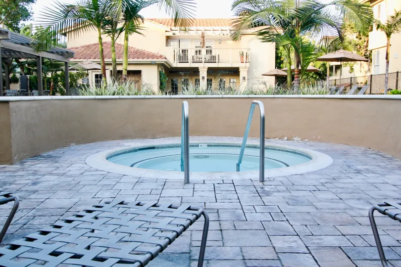 A metal railing with two sides leading to a hot tub in Ritz Pointe in Dana Point CA