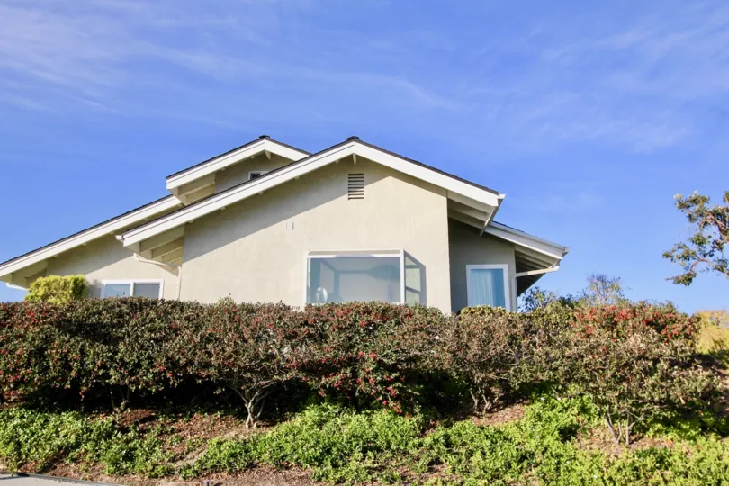 Side view with decorative plants of Sea Ridge community, Dana Point, CA