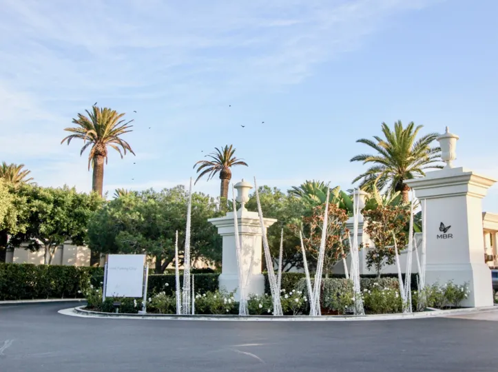 A day in the Sea Villas at St. Regis with a garden and road.