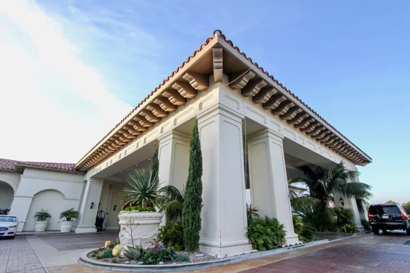 A car is parking in Sea villas at St. regis in front of the house