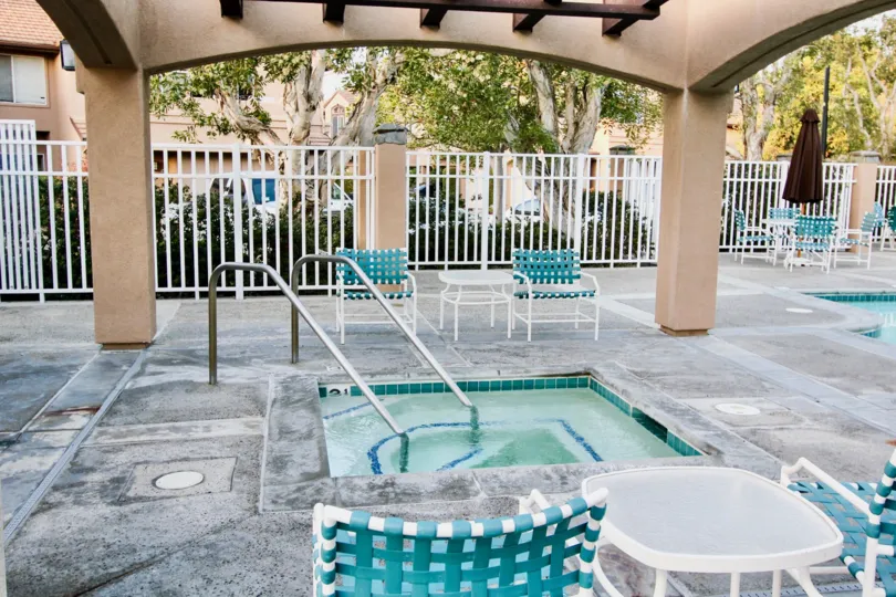 A day in the Silvertide with a small swimming pool and chairs.