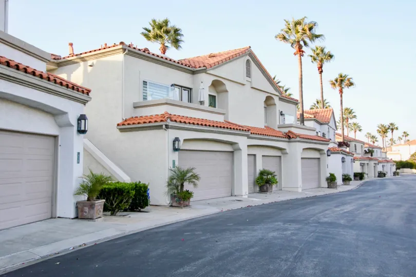 In Each Apartment in Tennis villas has light lamp is attached in wall near the car shed