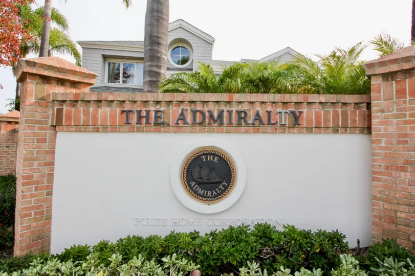 THE PULTE HOME CORPORATION IN THE The Admiralty WITH THE The Admiralty WALL, PLANTS, TREES