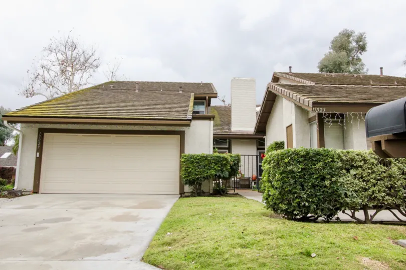 Garage next to house at Emerald Glen Fountain Valley, CA