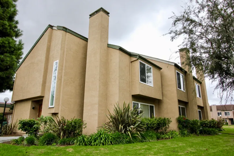A large residential home with tall ceiling and large windows in the Fountain park community.