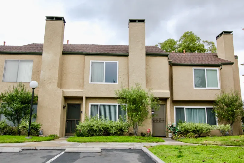 Multi level housing with large three panel windows in Fountain park community.
