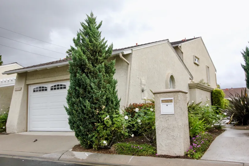 Green Valley Warner Village Fountain California triangle shaped building with top grown trees