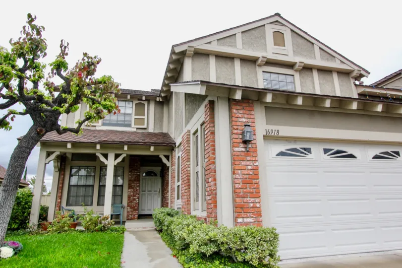 Red brick mulitstory house at Kingsbriar Fountain Valley CA