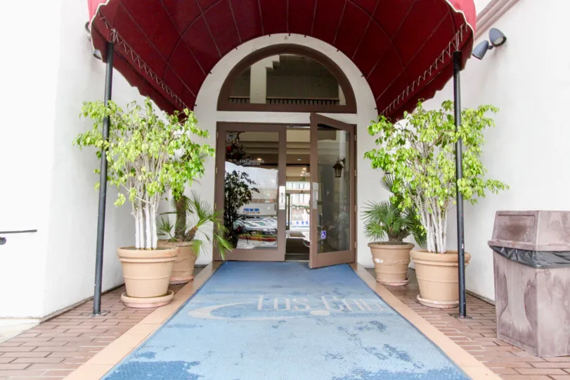 A Los Caballeros building entrance in Fountain Valley, California.