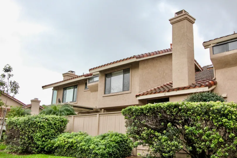 Mariposa Fountain Valley California factory like building with biscuit colored painting in outside
