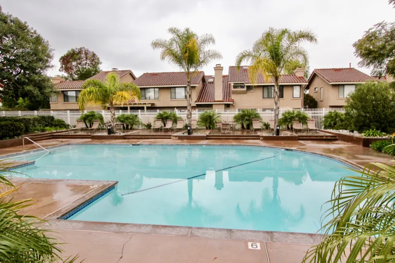 Mariposa Fountain Valley California biscuit colored building blocks with irregular shaped swimming pool