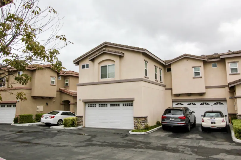 Summerstone Villas Fountain Valley California triangular shaped roofing model car parked at front door