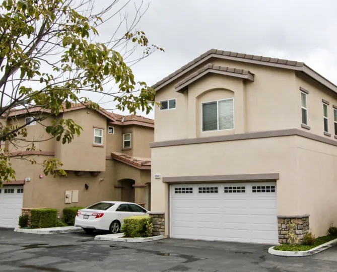 The rainy day in the Summerstone Villas with parking area and gardens.