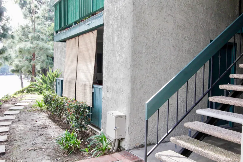 A building in Brea Country with a stair case and a balconies.