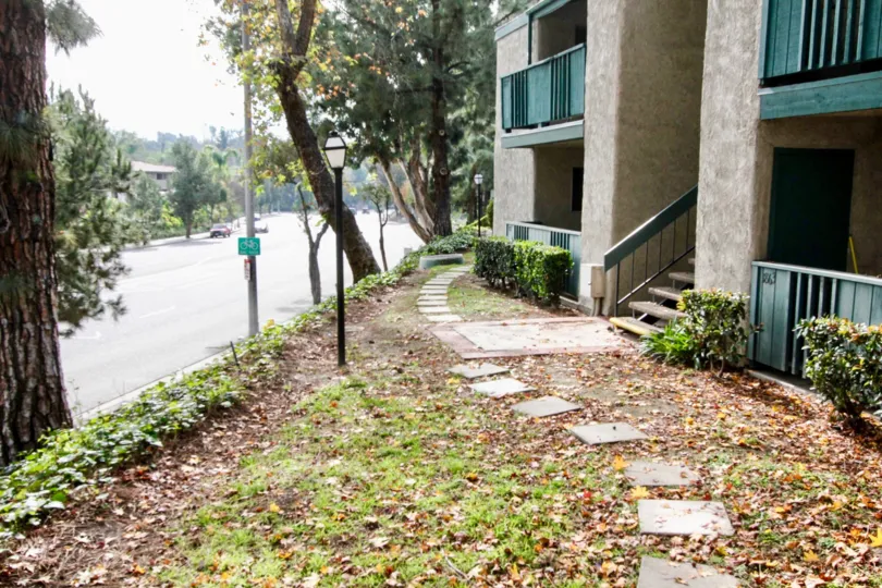 This is a picture of apartment complex next to street in Fullerton, CA