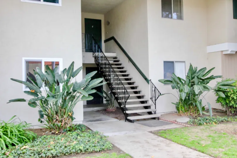 Single House with more steps for get in side and the door is closed at the morning time.