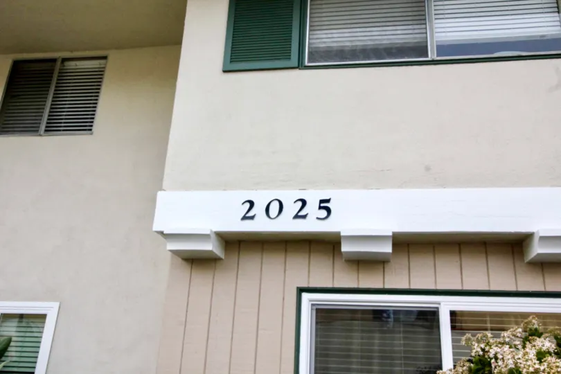 A day in the Casa Del Amo with a building and number.
