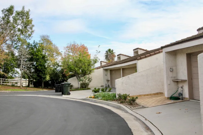 A great day in the Casa Del Vista with a building nearby the road.