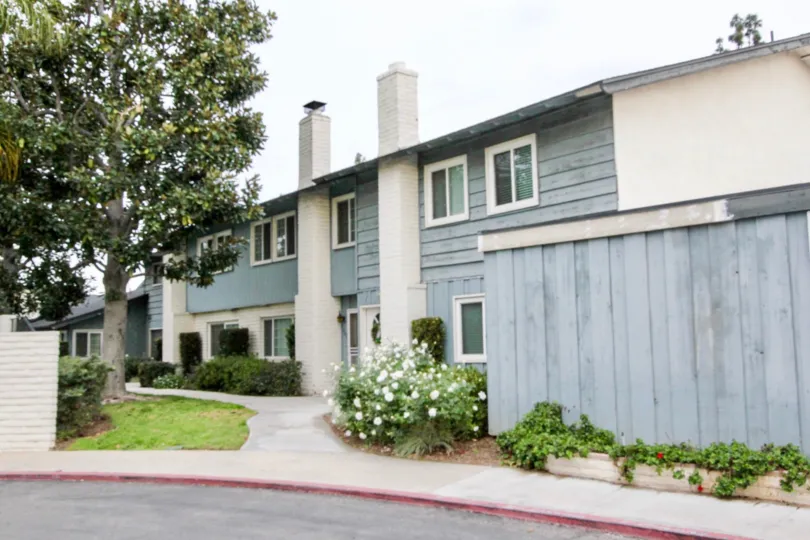 A path winds behind the buildings at Foothill Village in Fullerton