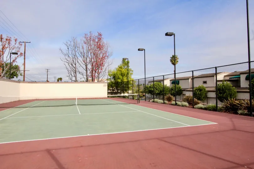 A cloudy day on the tennis courts behind Greenview Terrace in Fullerton, California