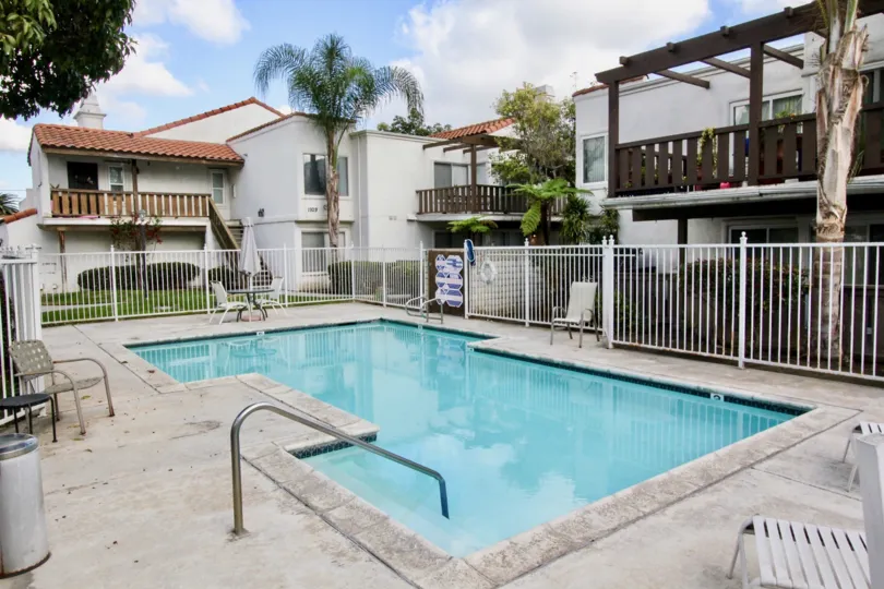 A relaxing looking pool surrounded by residential housing in heritage Fullerton community.
