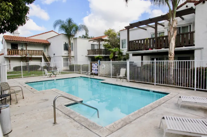 Heritage Fullerton California vertical lined model in gates, balcony, restricted valley and resting chairs