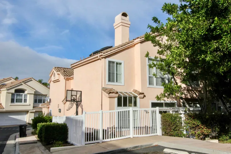 A sunny day outside the Maison de Fleur townhouses of Fullerton, California