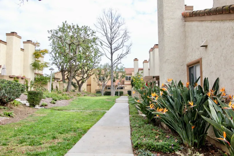 Long walkway leasing to residential housing in Mark III Townhomes community.