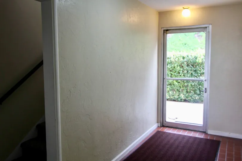 Inside the door of villa in Shadowlane, light bulb is on where that is morning