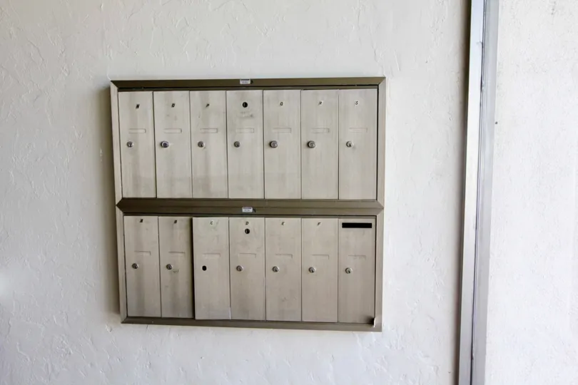 Shadow Lane Fullerton California with wall painted in plain white color having dotted slots