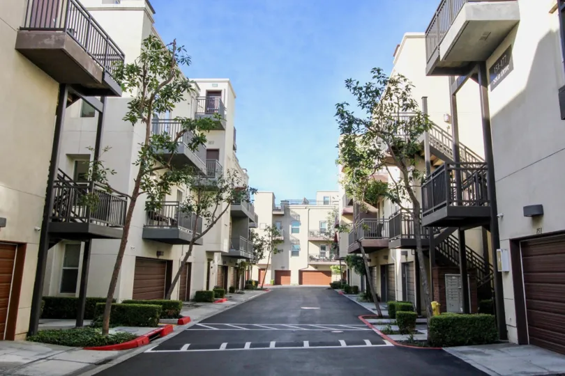 The sunny day in the Soco Walk with villas and small gardens,