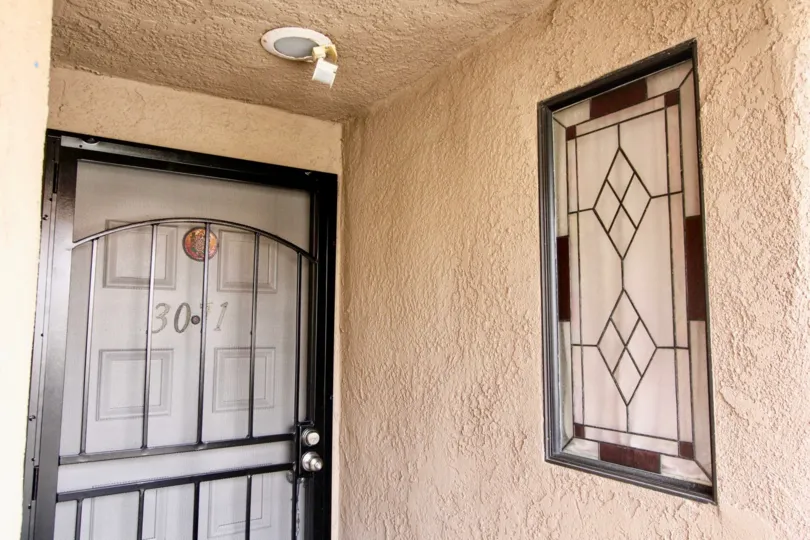 Via Valencia Fullerton California rough wall design with nice biscuit color painting and lights