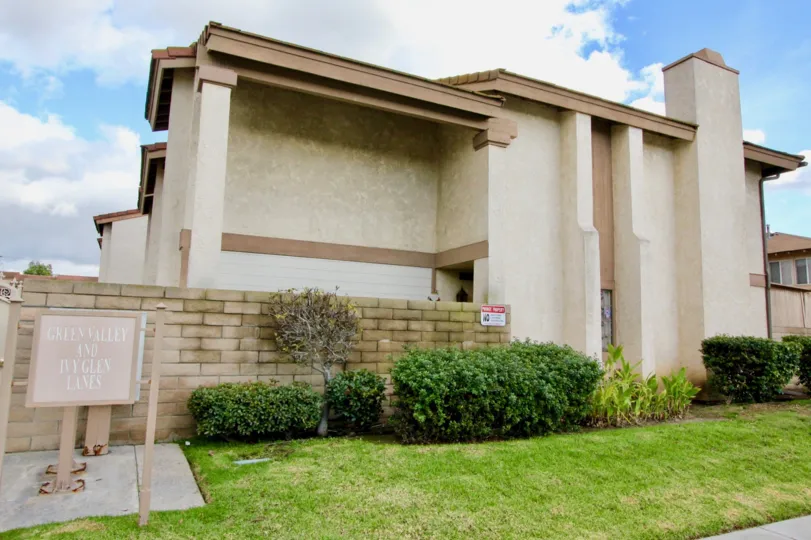 Outside to the Apartment in Adelle terrace has board with meadows