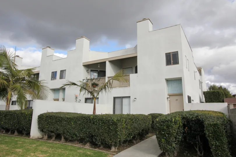 THE FRONT VIEW OF HOME WITH DOOR NO, FRONTLY LOT OF PLANTS ARE SHOWN IN THE CITY OF GARDEN GROVE