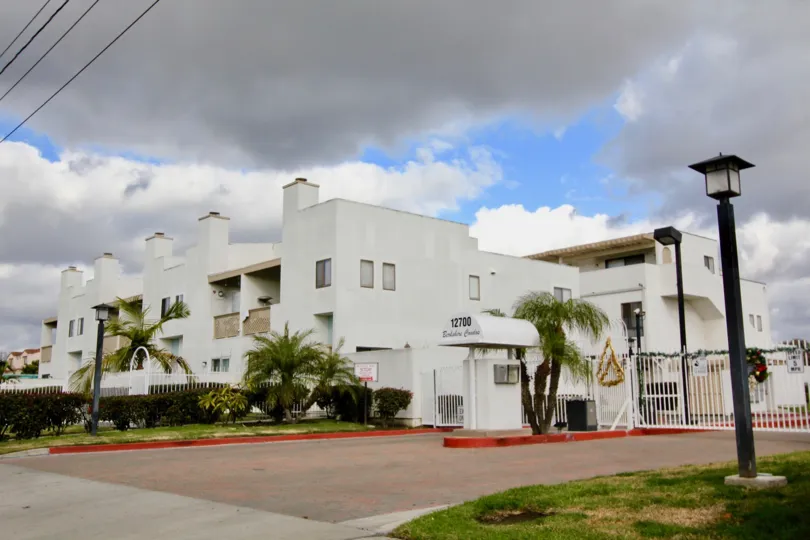 An overcast sky over a white building inside Berkshire condos community