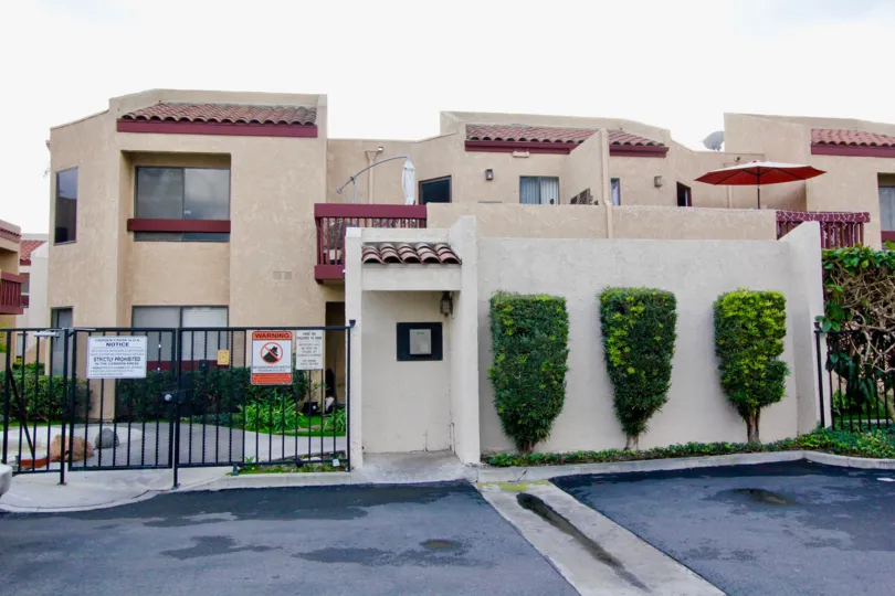 THIS PLACE REPRESENTS THE BEAUTIFUL FLATS THAT HAS THE STEELGATE AND THE PLANTS ARE PLANTED AND SHOWS THE PATHWAY TO THE HOME IS IN THE CITY OF GARDEN GROVE