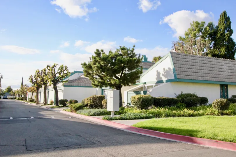 Street view of the Garden Greens Community on a sunny day in Garden Grove, California.