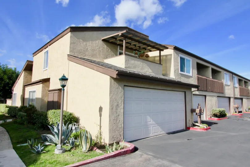 A large block of two story town homes with garages inside Garden Terrace Townhomes in Garden Grove CA