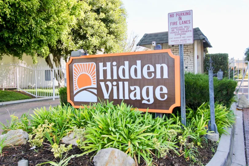 THIS IMAGE REPRESENTS THE ENTRANCE WAY TO HIDDEN VILLAGE WHICH IS SITUATED IN THE CITY OF GARDEN GROVE