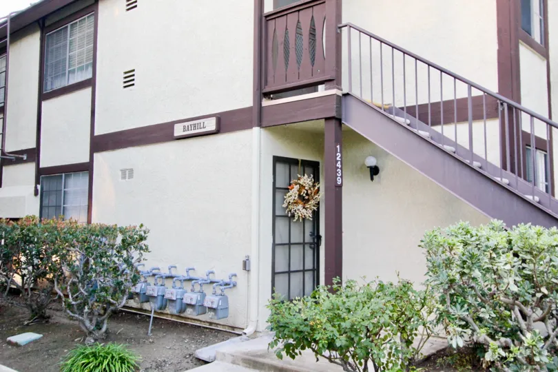 The Les Jardins in the Garden Grove with House and trees
