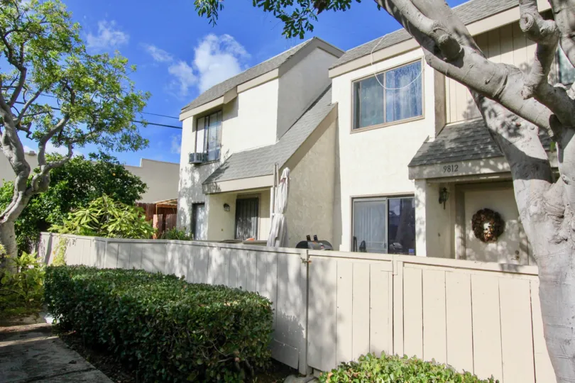 A beautiful white home located in the Livingstons Meadows community in sunny Garden Grove, California