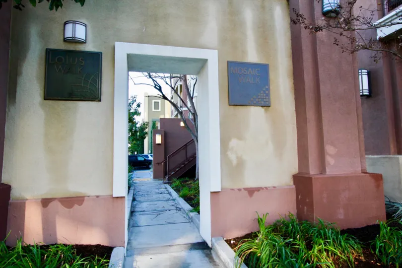 A path winding through a residential area, known as the Lotus Walk, locate in Garden Grove, California.