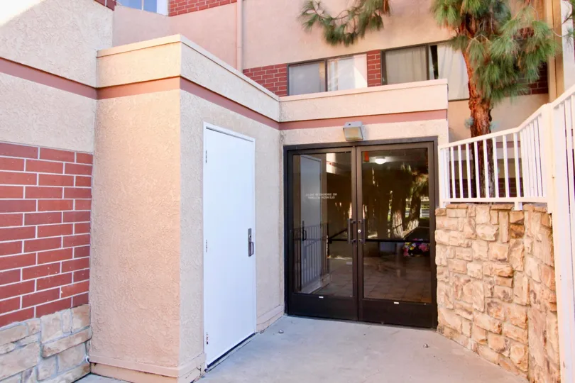 THIS IS THE ENTRANCE WAY TO THE VILLA, BRICK RED IN COLOUR WHICH IS IN GARDEN GROVE CITY
