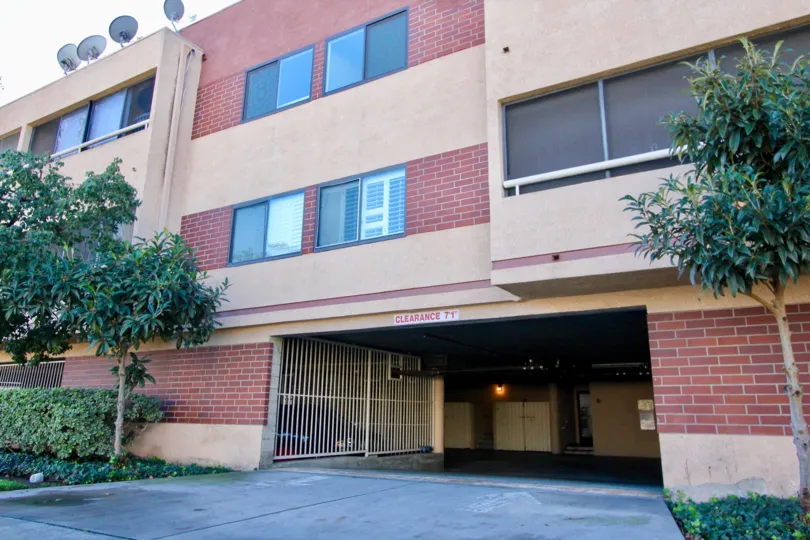 Brick exterior and nice landscaping at Martinique Royale in Garden Grove, CA