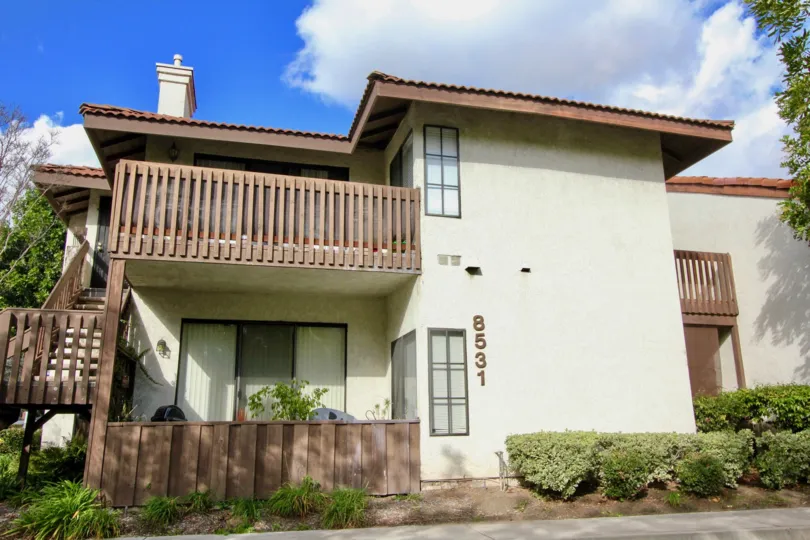 AN INDEPENDENT VILLA OF AREA AROUND 2000 SQUARE FEET WITH AN WOODEN STAIRCASE TO THE FIRST FLOOR