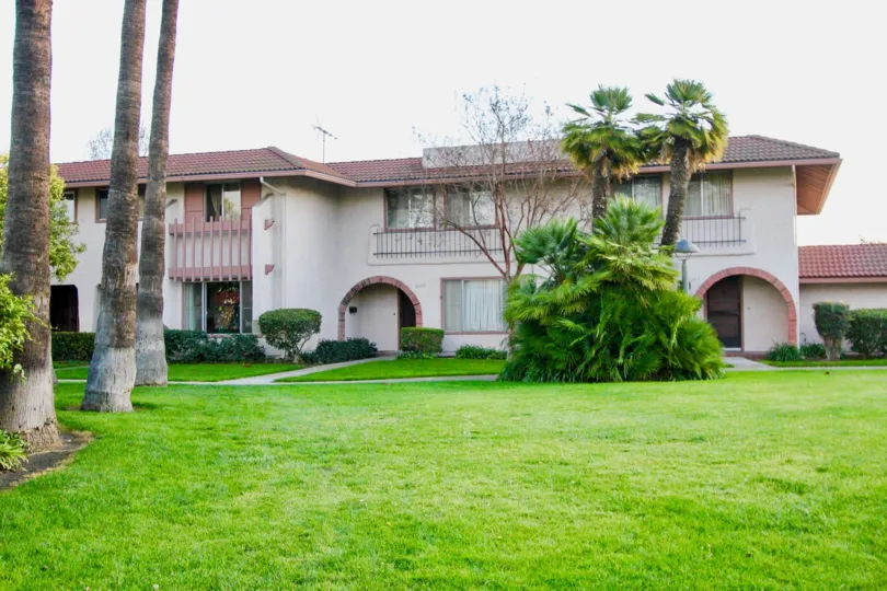 Palm trees and Spanish details welcome you at Montecito Plaza in Garden Grove, CA