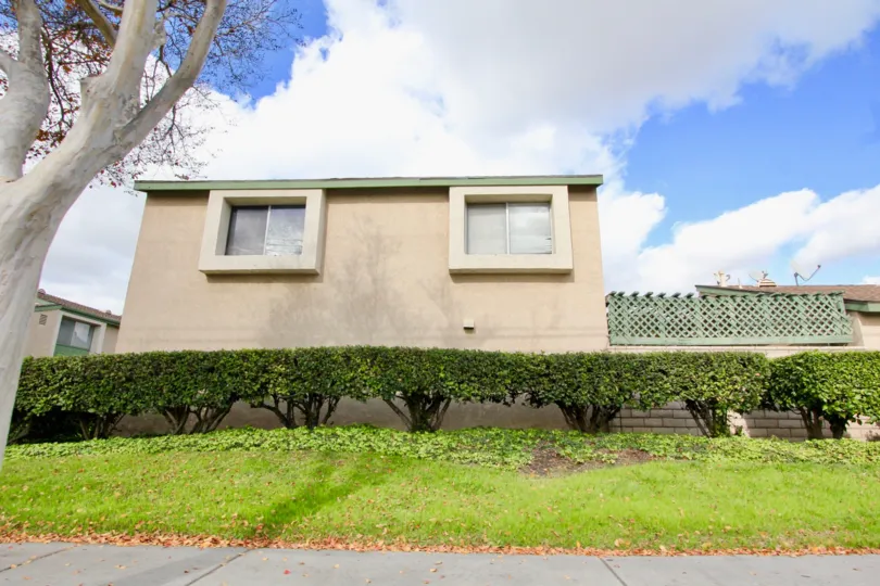 Pacific Gardens side View having small green Garden at Garden Grove city
