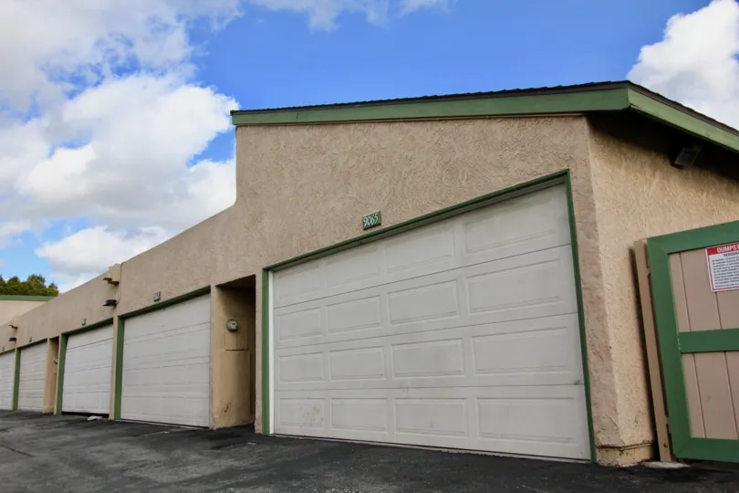 Garage doors with closed shutters in the Pacific Gardens community