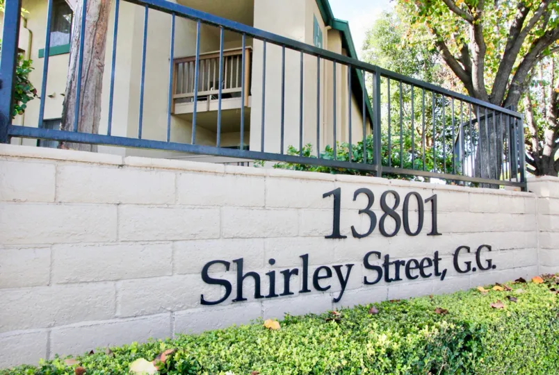 Park Glenwood Building with green garden location view at Garden Grove