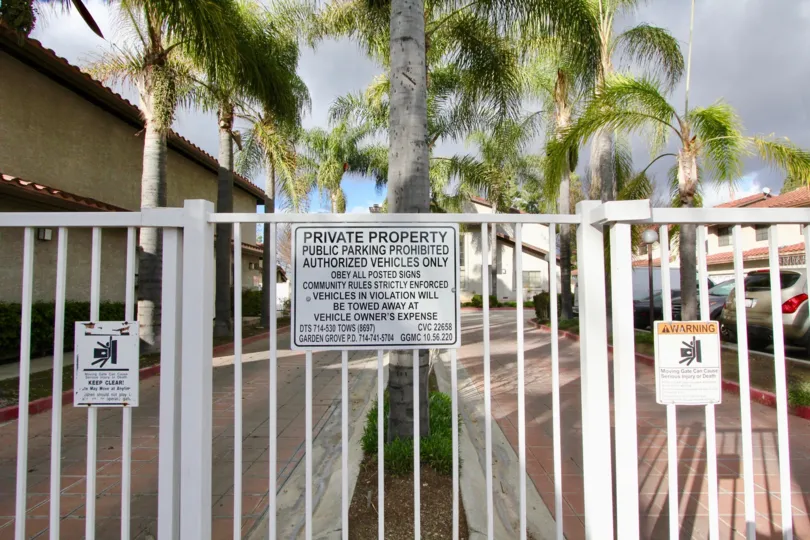 THIS SHOWS THE BACKSIDE OF THE VILLAS, CAR PARKING IS THERE, MANY TREES ARE THERE IN REGENCY TERRACE